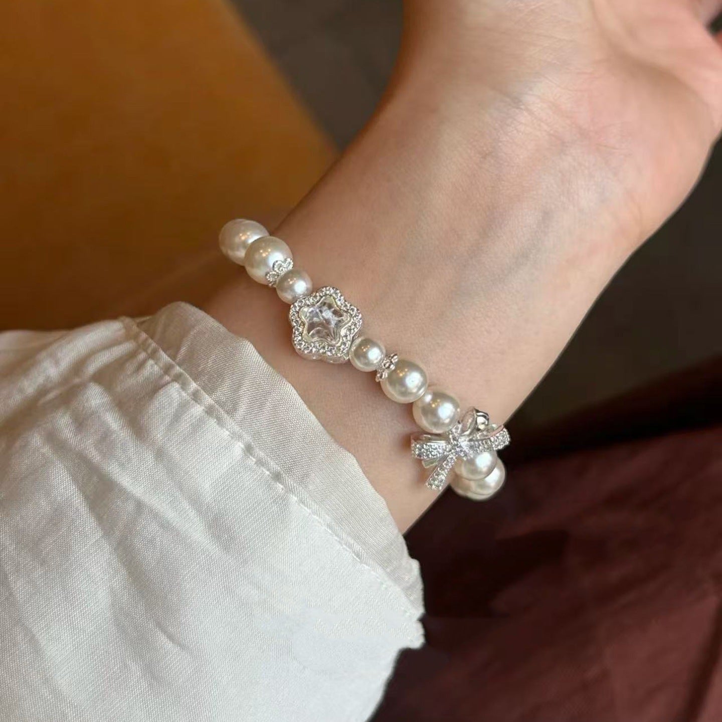 Elegant Pearl Crystal Bow Silver