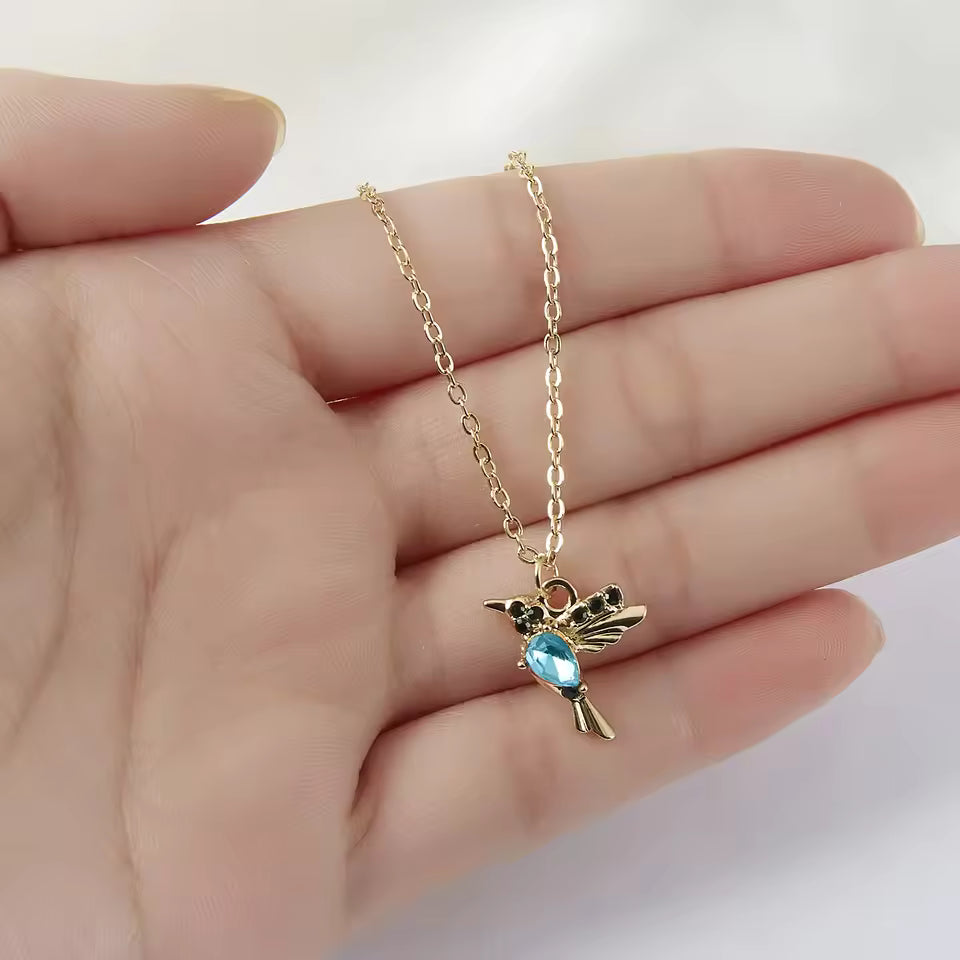 Elegant Topaz Bird Necklace