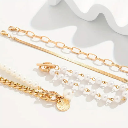 Chic Gold 4-Piece Bracelet Set ��� Snake, Pearls & Links | Gold