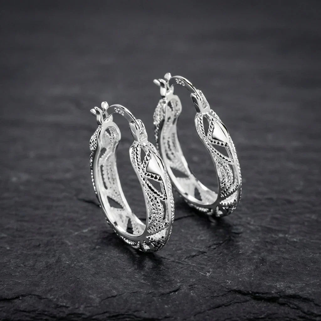 Elegant Carved Silver Earrings