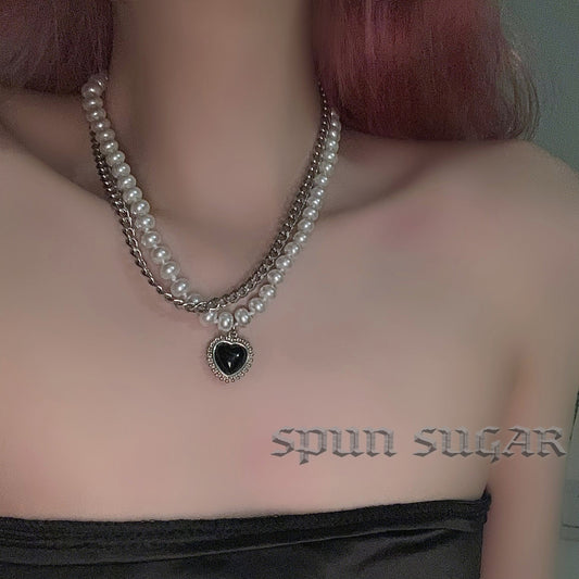 Elegant Pearl Black Heart Pendant