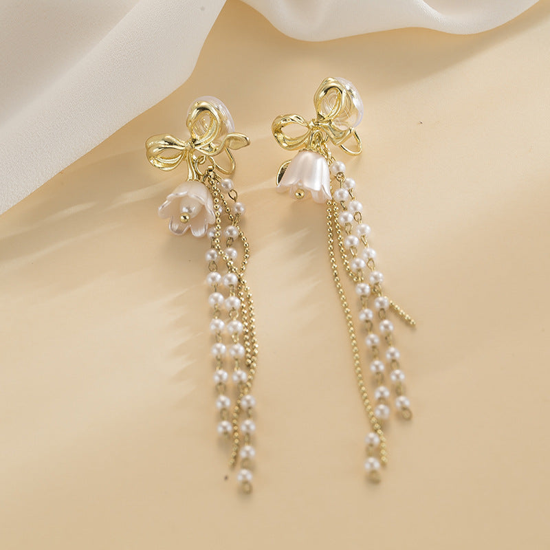 Elegant Pearl Bow Earrings