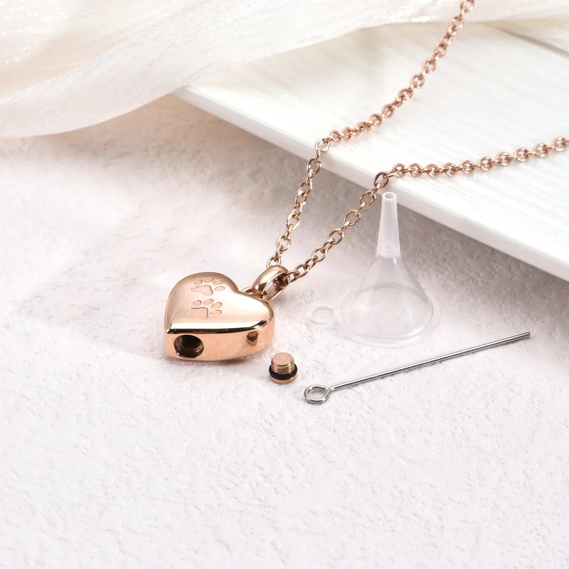 Pet Memorial Urn Necklace ��� Heart-Shaped Pendant With Paw Engraving