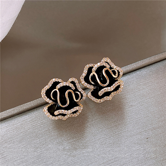 Elegant Black Lotus Earrings In Gold