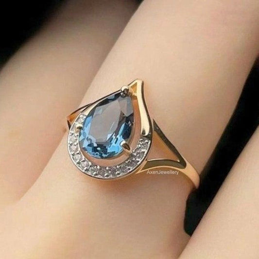Blue Drop Orbit Gold Ring